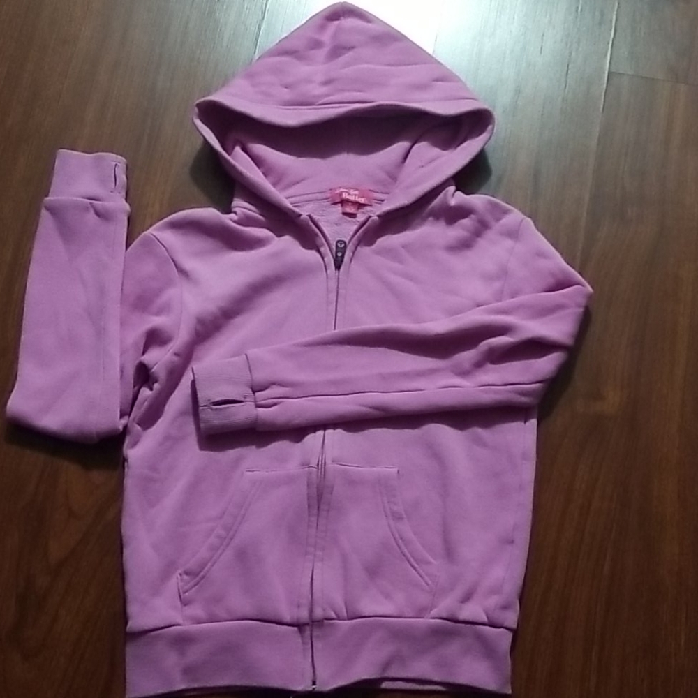 Butter hoodie with sparkling doggies in the  back.